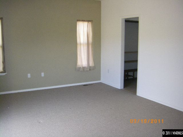 3500 Outback Lane Reno, NV 89510 - Photo 2 of 7 an empty room with windows