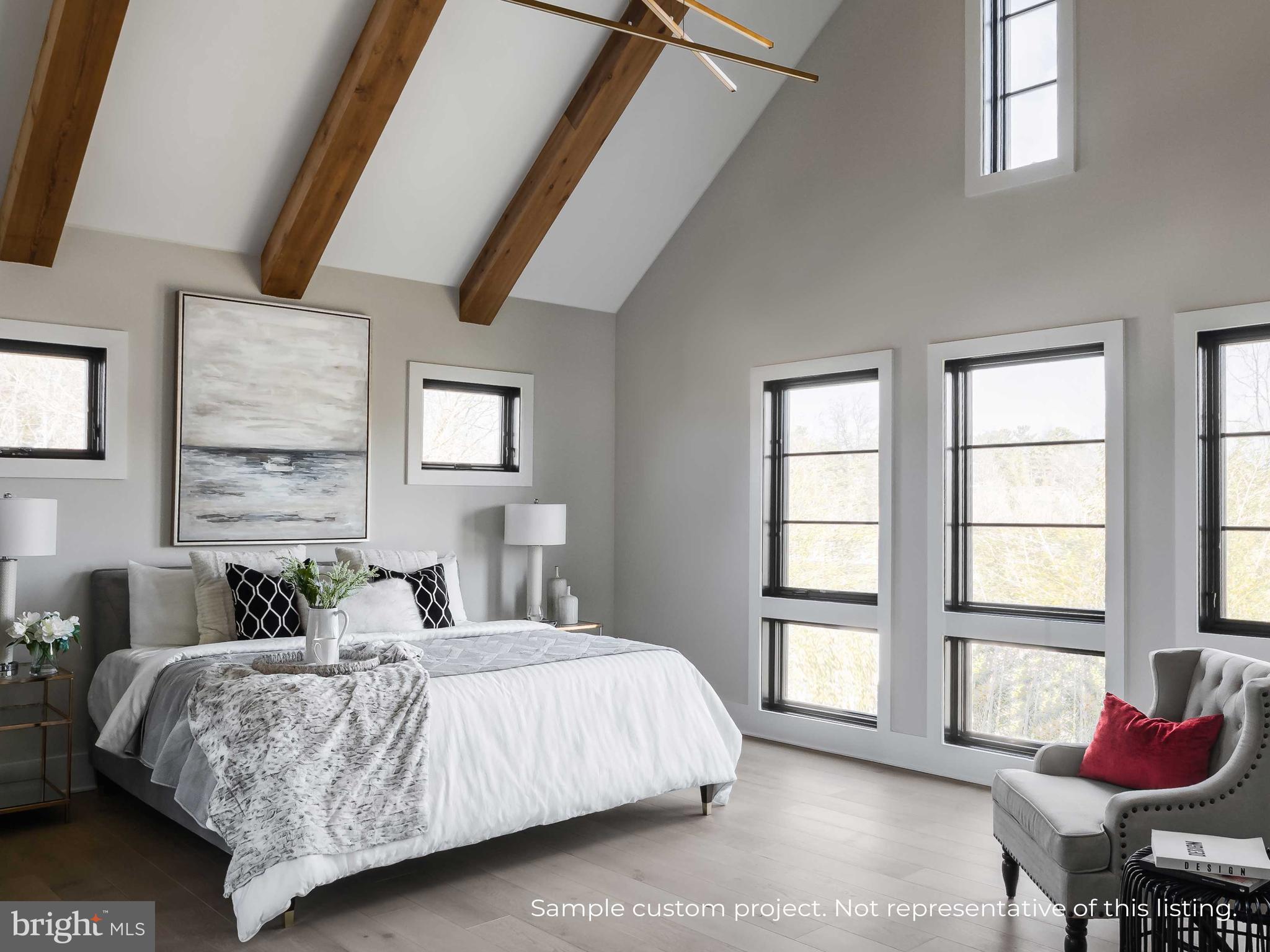 13017 Glen Road North Potomac, MD 20878 - Photo 12 of 28 a bedroom with a bed and windows