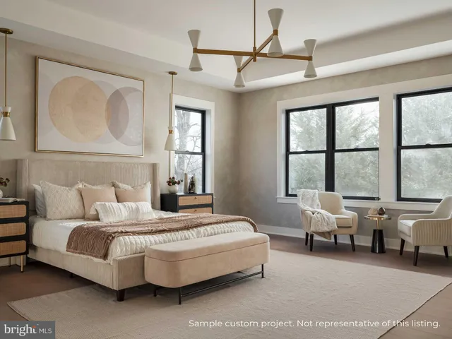 a bedroom with a bed couch and window