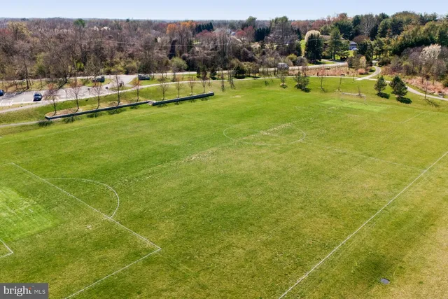 a view of a house with a big yard