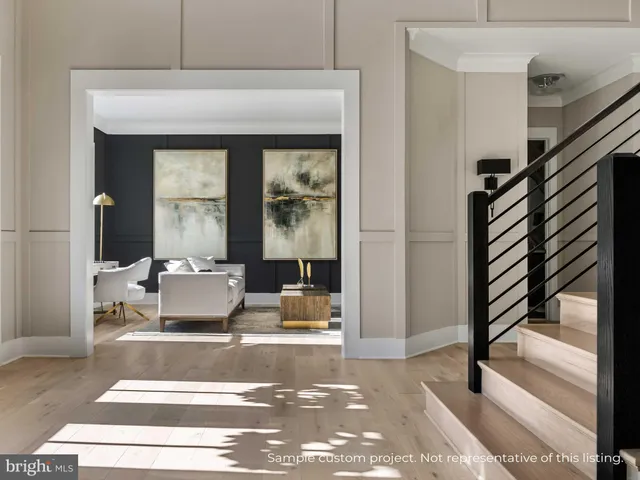 a living room with furniture and a gate