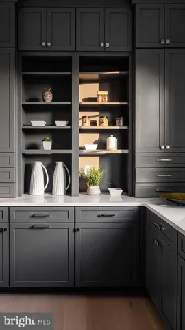 a kitchen with a sink and cabinets