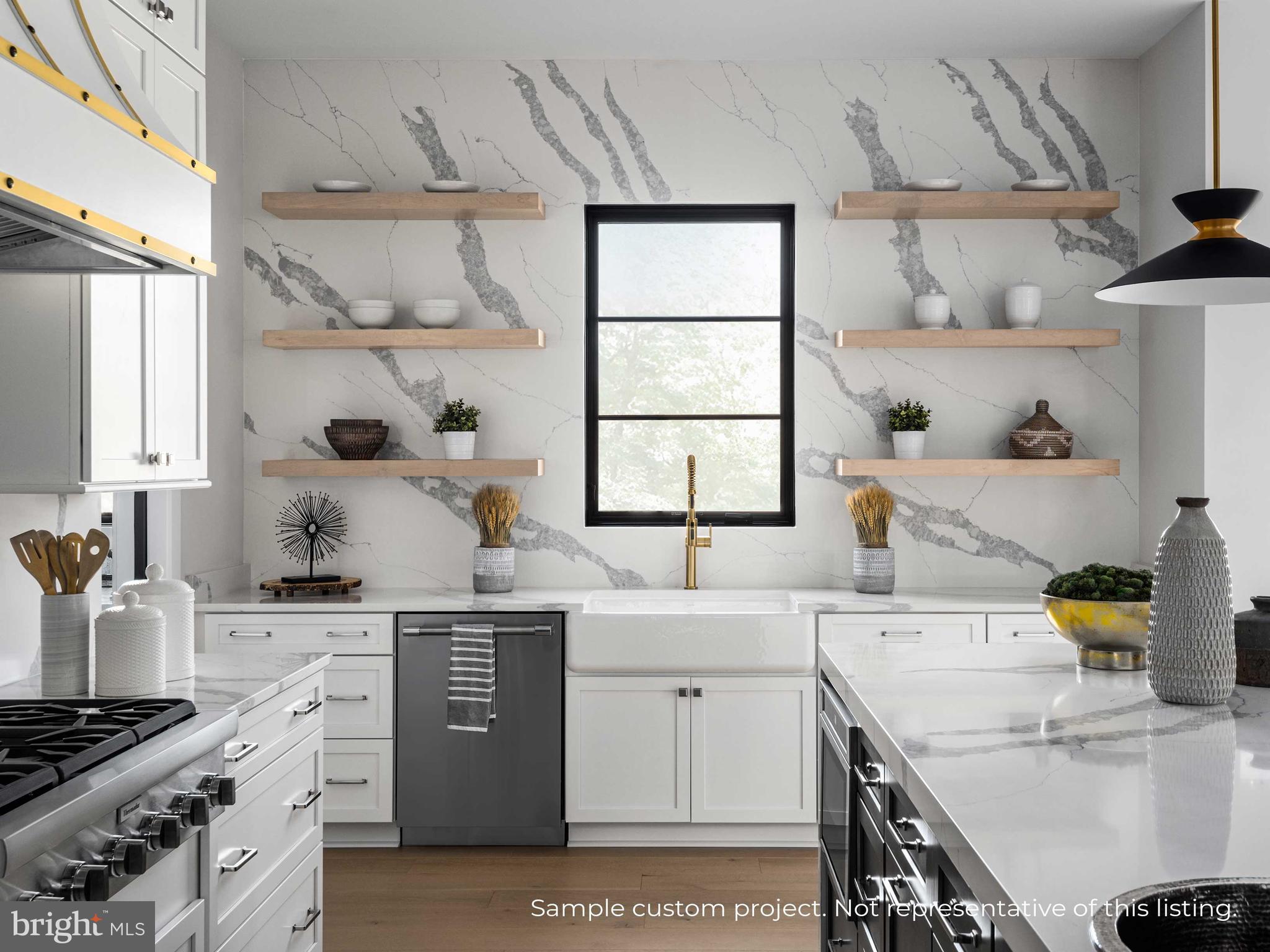 13017 Glen Road North Potomac, MD 20878 - Photo 8 of 28 a kitchen with a stove and a sink