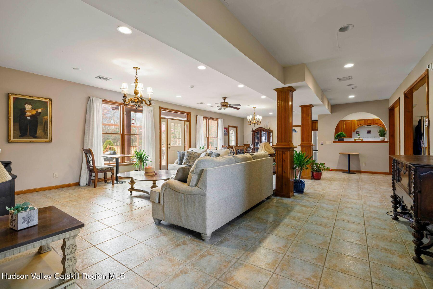 404 Winter Clove Road Round Top, NY 12473 - Photo 70 of 133 a living room with furniture and a flat screen tv