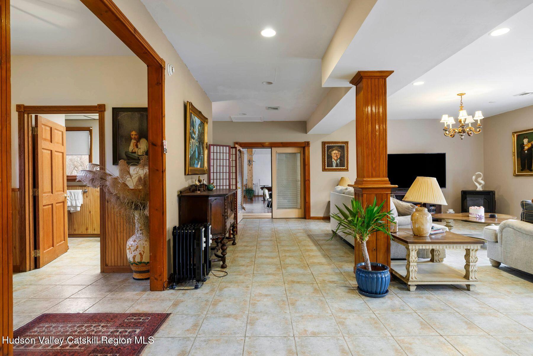 404 Winter Clove Road Round Top, NY 12473 - Photo 78 of 133 a living room with furniture and a flat screen tv