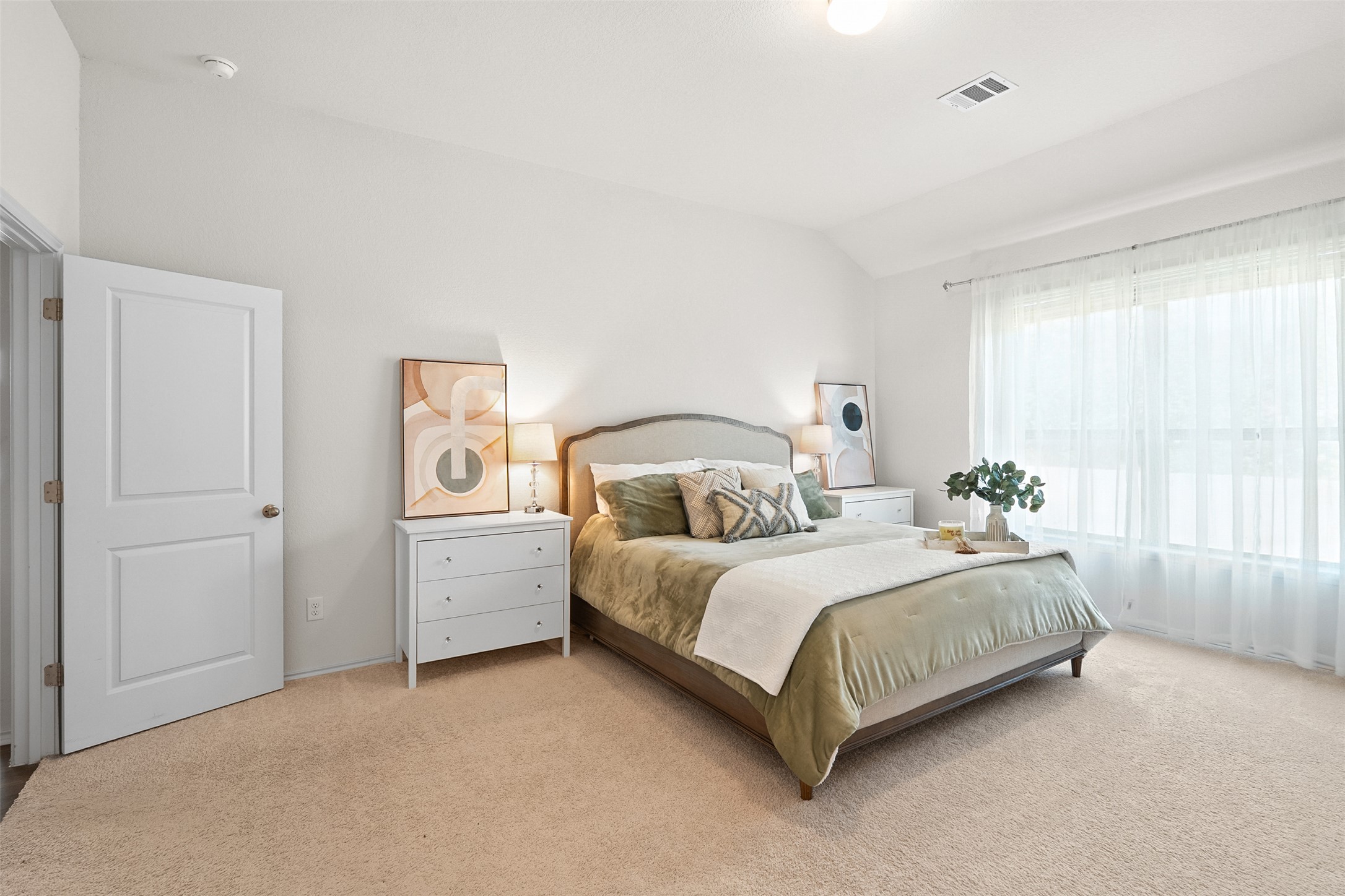 211 Brookside Street Hutto, TX 78634 - Photo 17 of 40 Carpeted bedroom featuring lofted ceiling