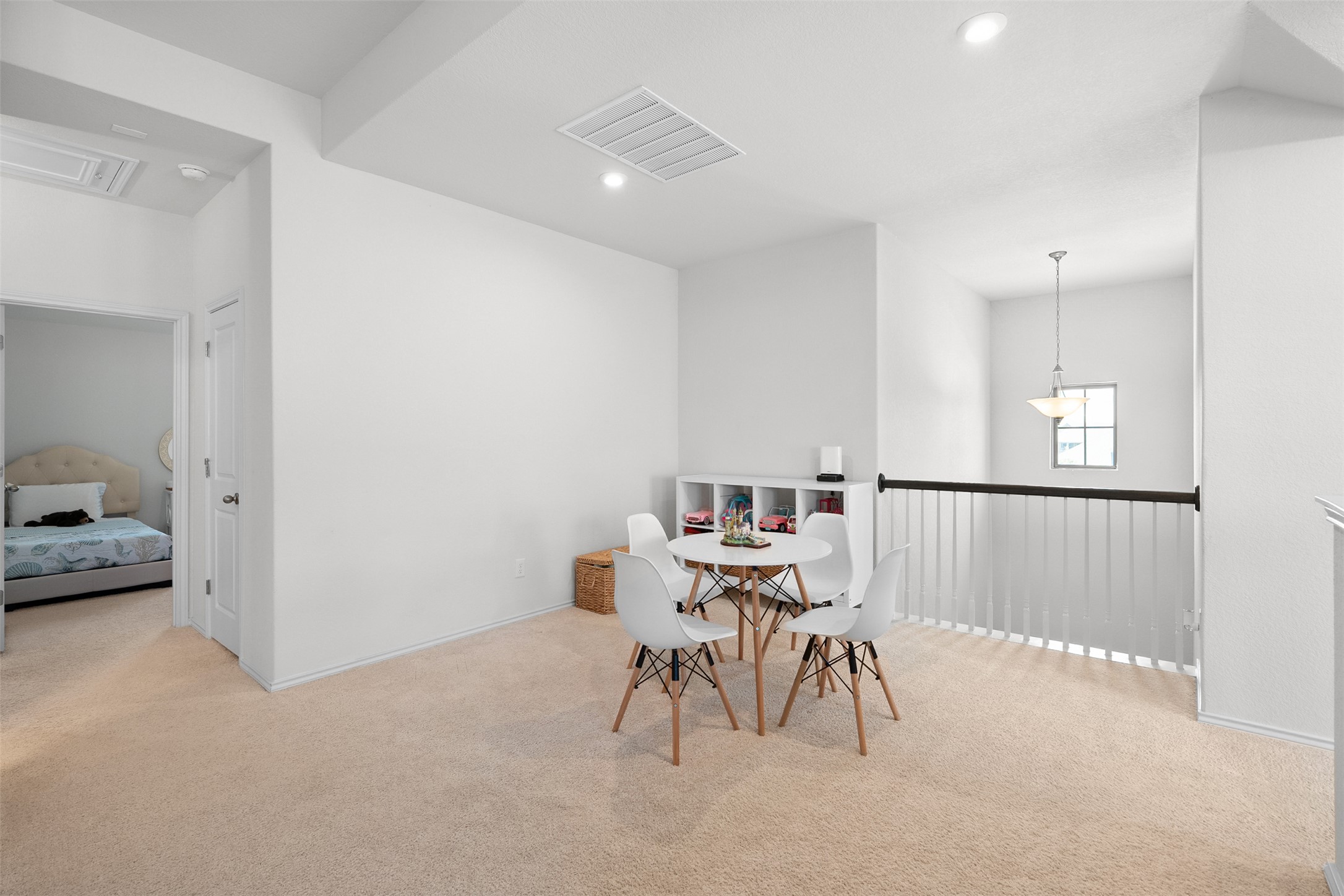 211 Brookside Street Hutto, TX 78634 - Photo 27 of 40 Dining room featuring light carpet and recessed lighting