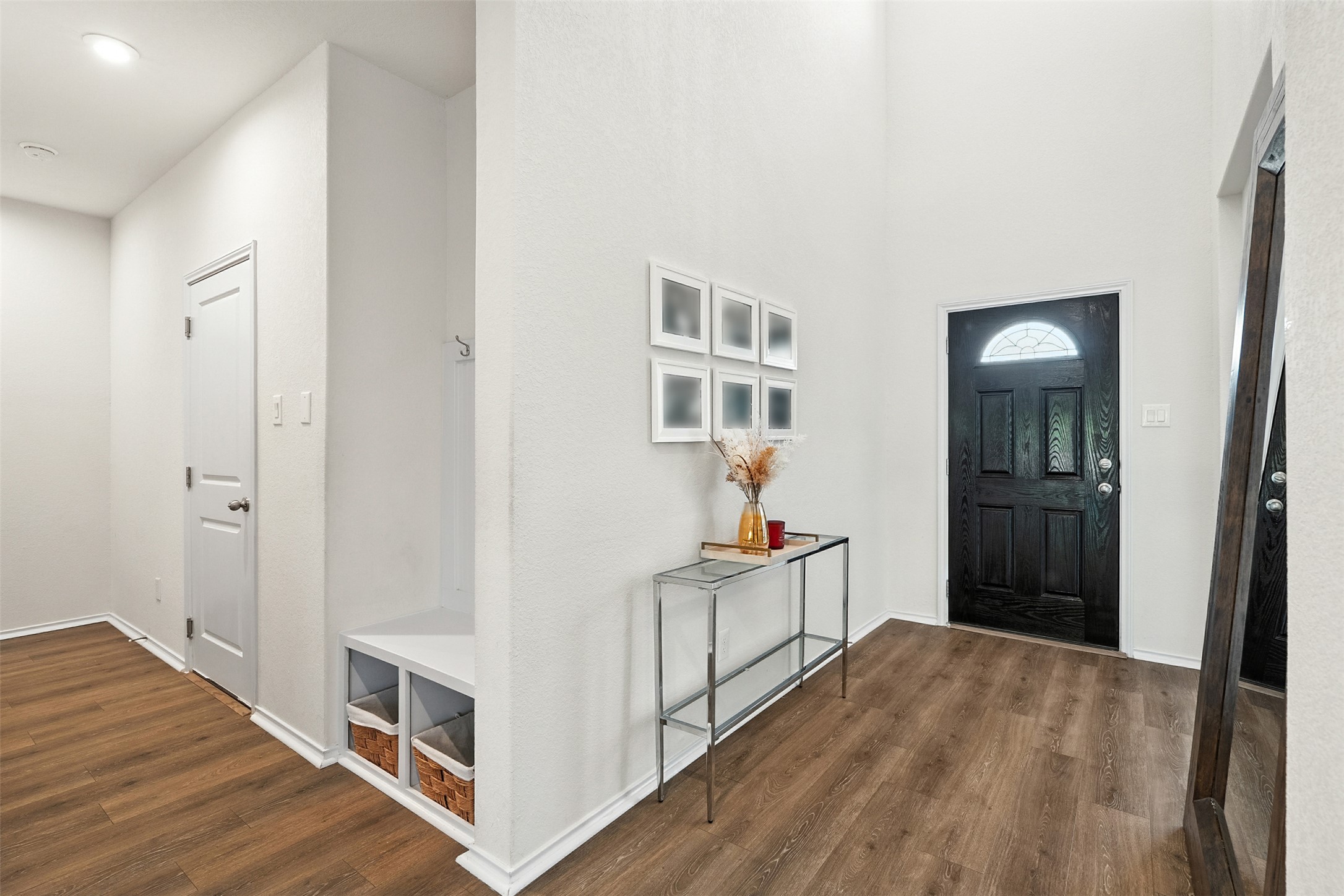 211 Brookside Street Hutto, TX 78634 - Photo 37 of 40 Entrance foyer with dark wood finished floors and a towering ceiling