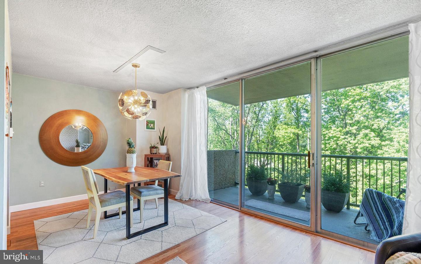 2016 Naamans Road, Unit D2 Wilmington, DE 19810 - Photo 11 of 21 Bright dining area with scenic balcony view.
