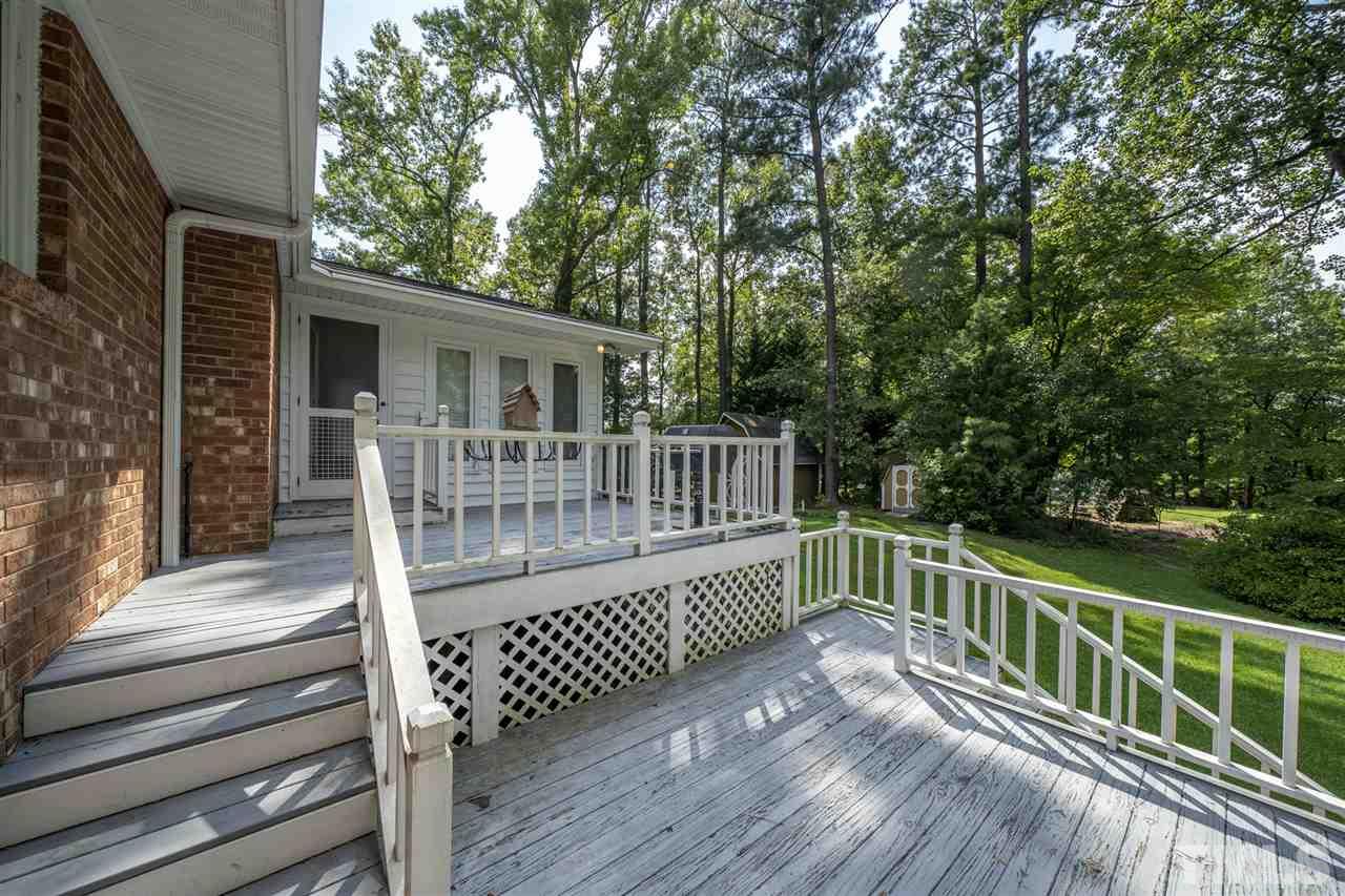 3307 Baugh Street Raleigh, NC 27604 - Photo 22 of 27 a view of deck with wooden floor and fence