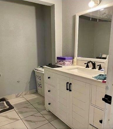 26342 Welch Road Splendora, TX 77372 - Photo 13 of 15 a bathroom with a sink and a mirror