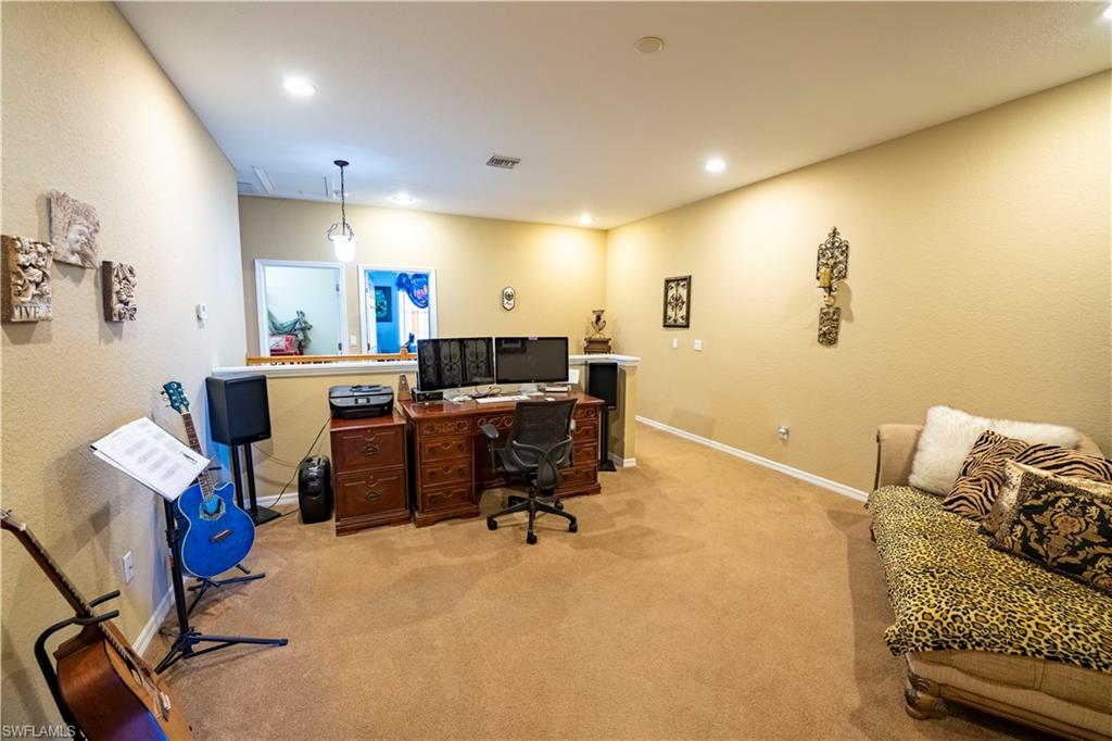 20007 Larino Loop Estero, FL 33928 - Photo 14 of 27 a view of a workspace with furniture