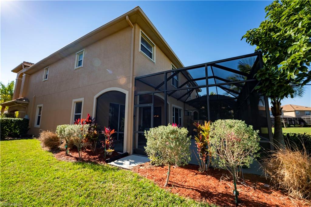 20007 Larino Loop Estero, FL 33928 - Photo 27 of 27 a front view of a house