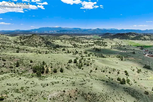 a view of a sky with green space