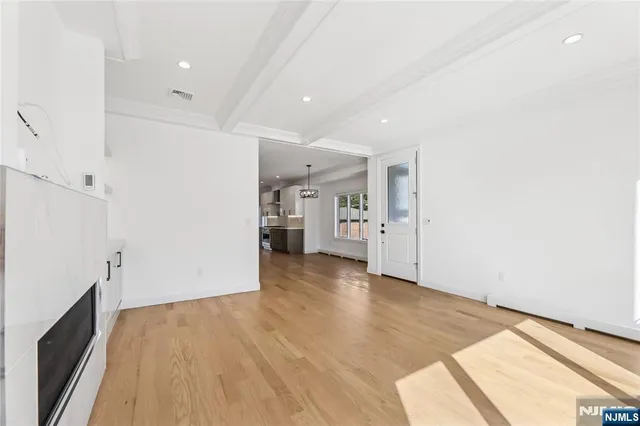 a view of a living room and a kitchen