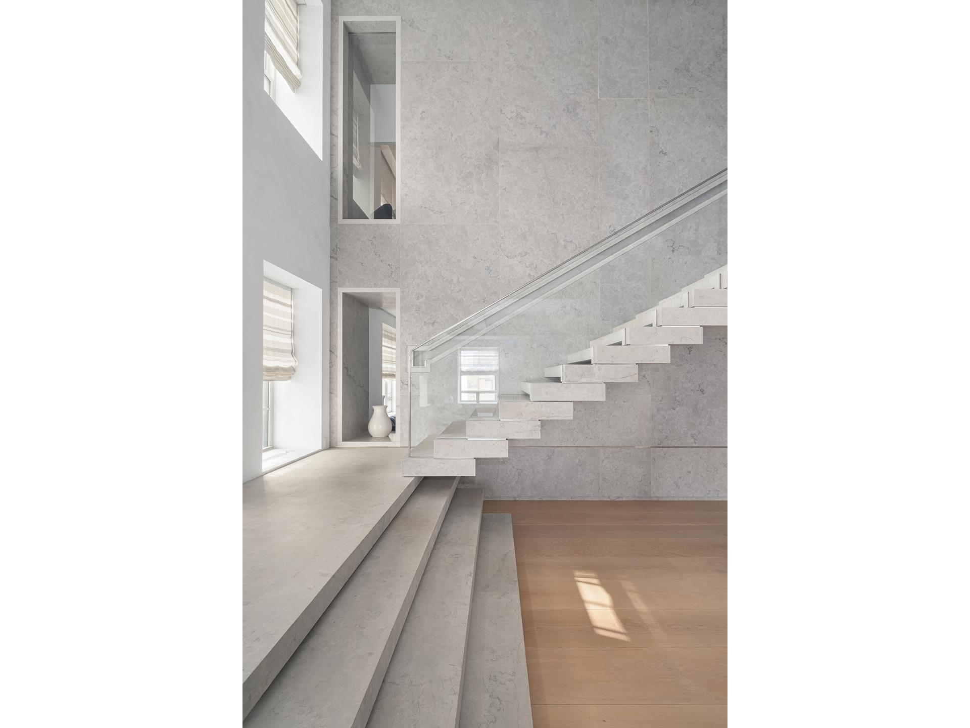 730 Park Avenue, Unit 10C/11C Manhattan, NY 10021 - Photo 16 of 27 a view of a living room with a white walls