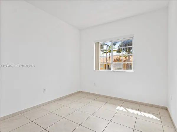 a view of an entryway with white walls