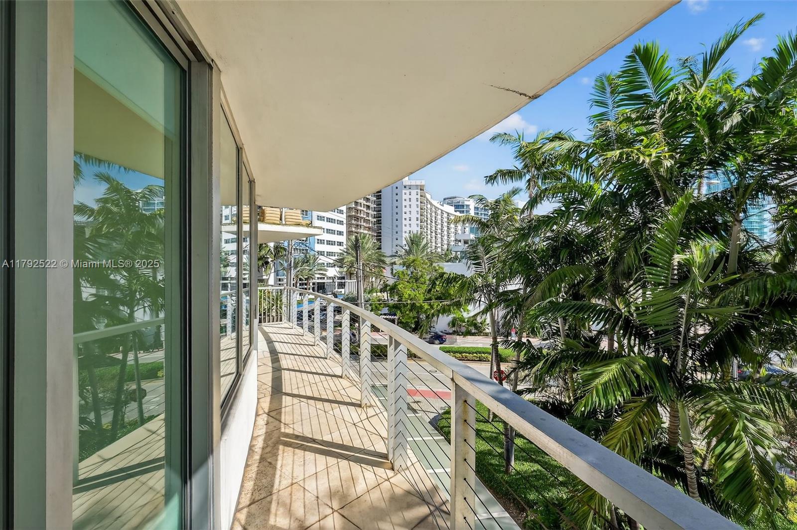 6305 Indian Creek Drive, Unit 3F Miami Beach, FL 33141 - Photo 18 of 60 a view of balcony and yard