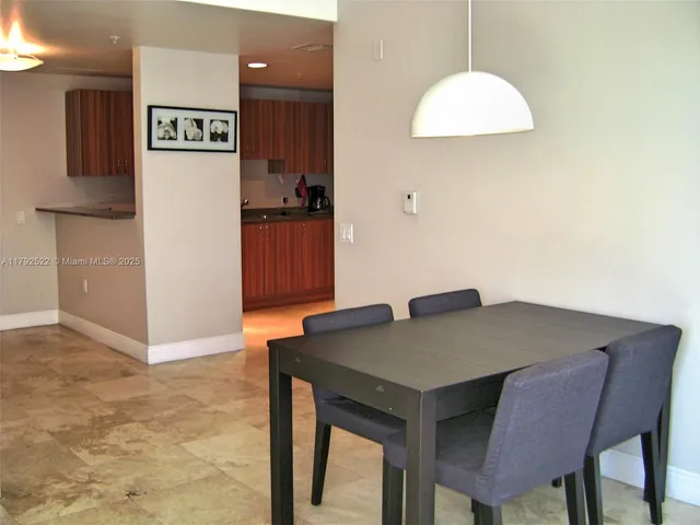 a view of a room that has a large window