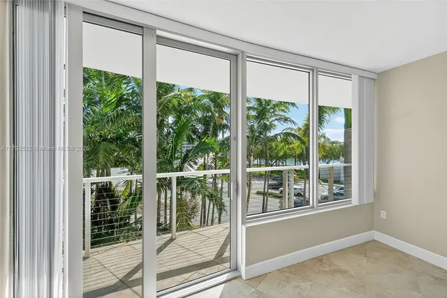 a view of a room with a large window