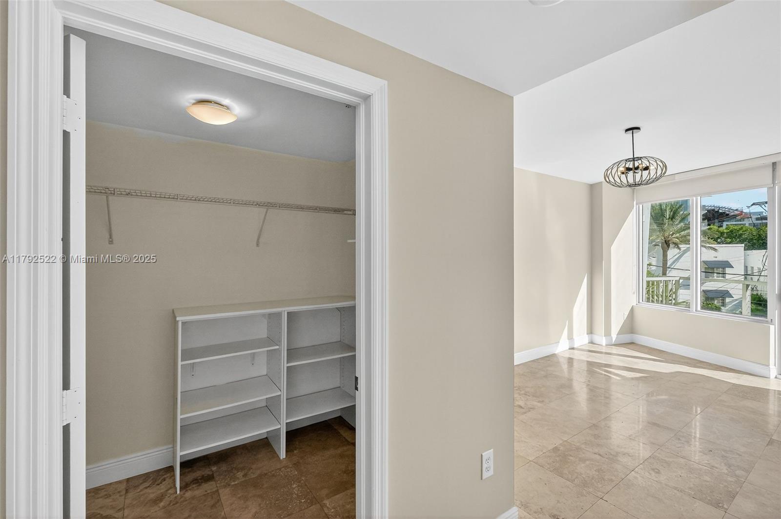 6305 Indian Creek Drive, Unit 3F Miami Beach, FL 33141 - Photo 35 of 60 a view of room with walk in closet and window