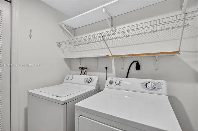 a view of a backyard with sitting area