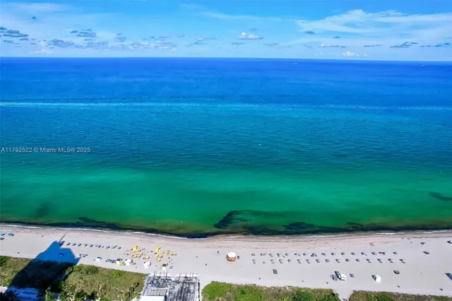a view of a city with lots of buildings and trees