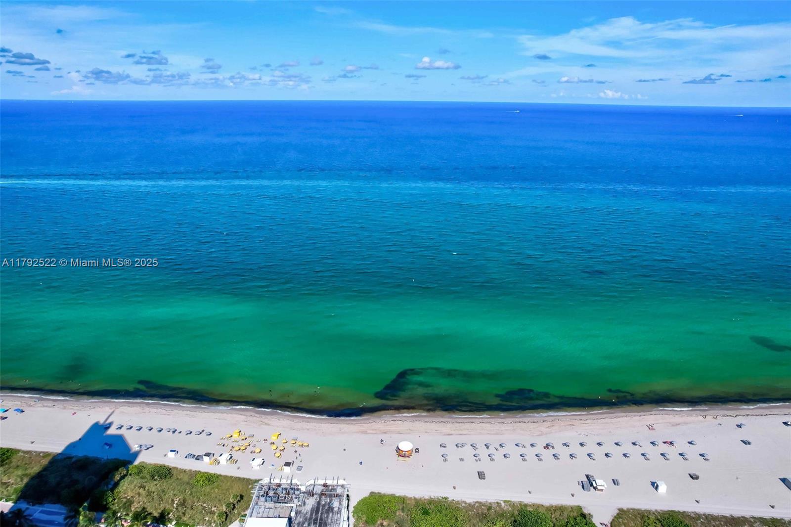 6305 Indian Creek Drive, Unit 3F Miami Beach, FL 33141 - Photo 5 of 60 a view of a yard with an ocean