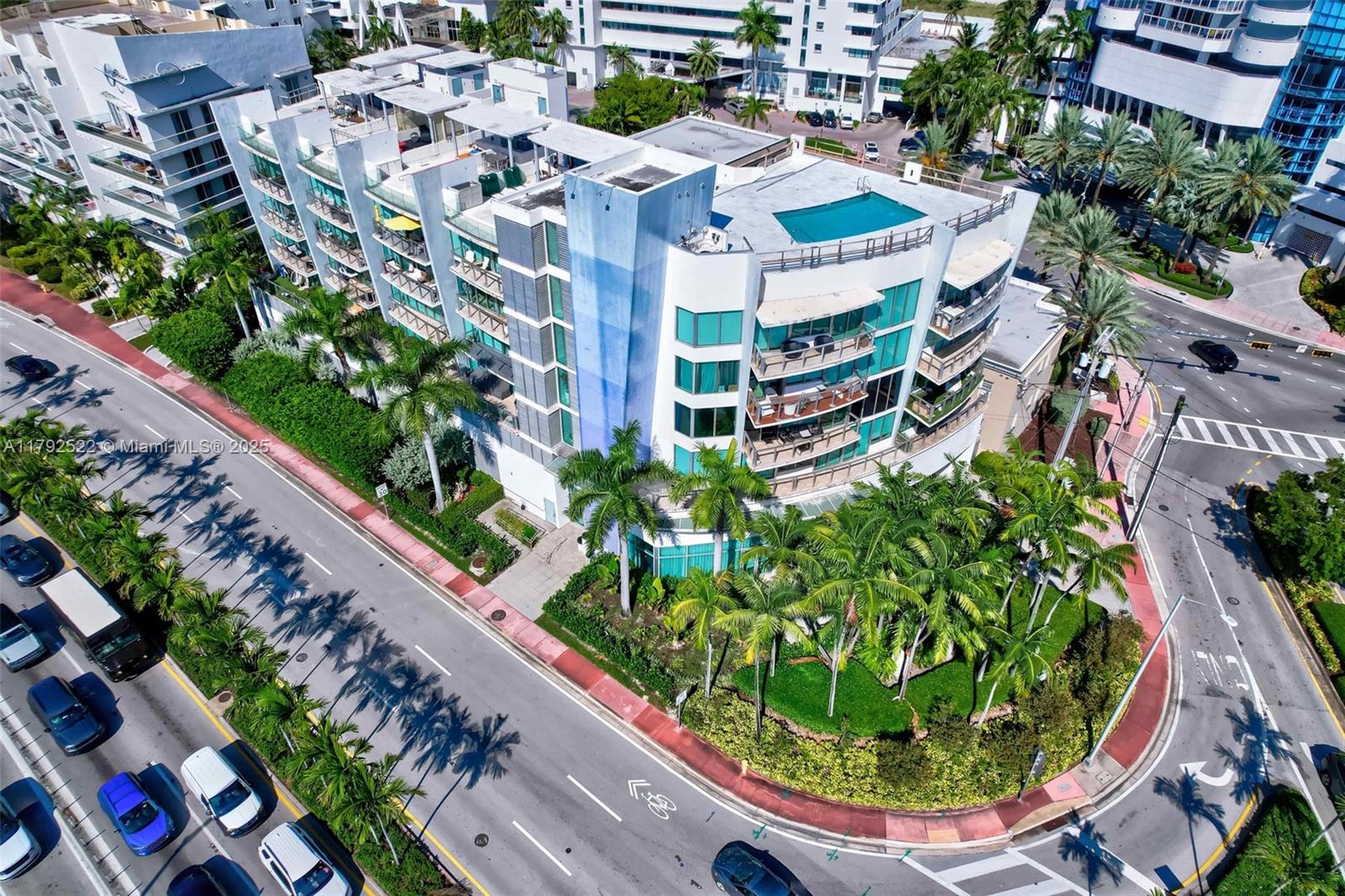6305 Indian Creek Drive, Unit 3F Miami Beach, FL 33141 - Photo 52 of 60 a view of a swimming pool with outdoor seating