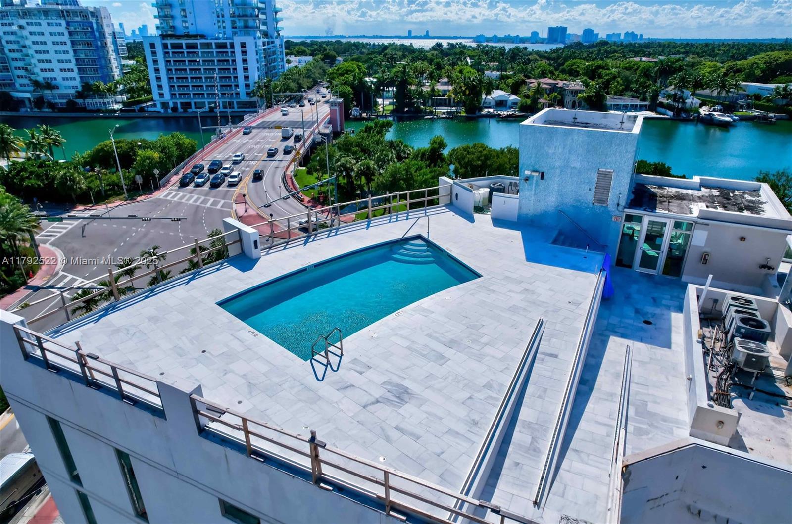 6305 Indian Creek Drive, Unit 3F Miami Beach, FL 33141 - Photo 58 of 60 a view of a backyard with sitting area