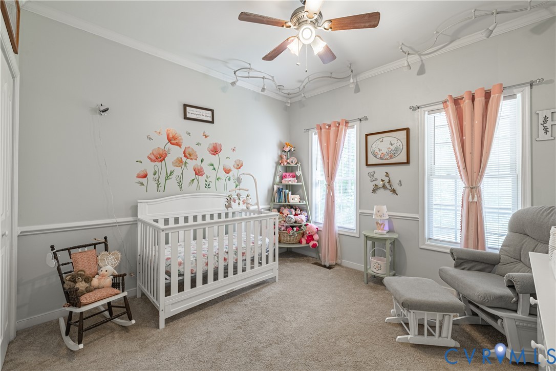 4789 Tatum Road Disputanta, VA 23842 - Photo 21 of 46 a bedroom with furniture and windows