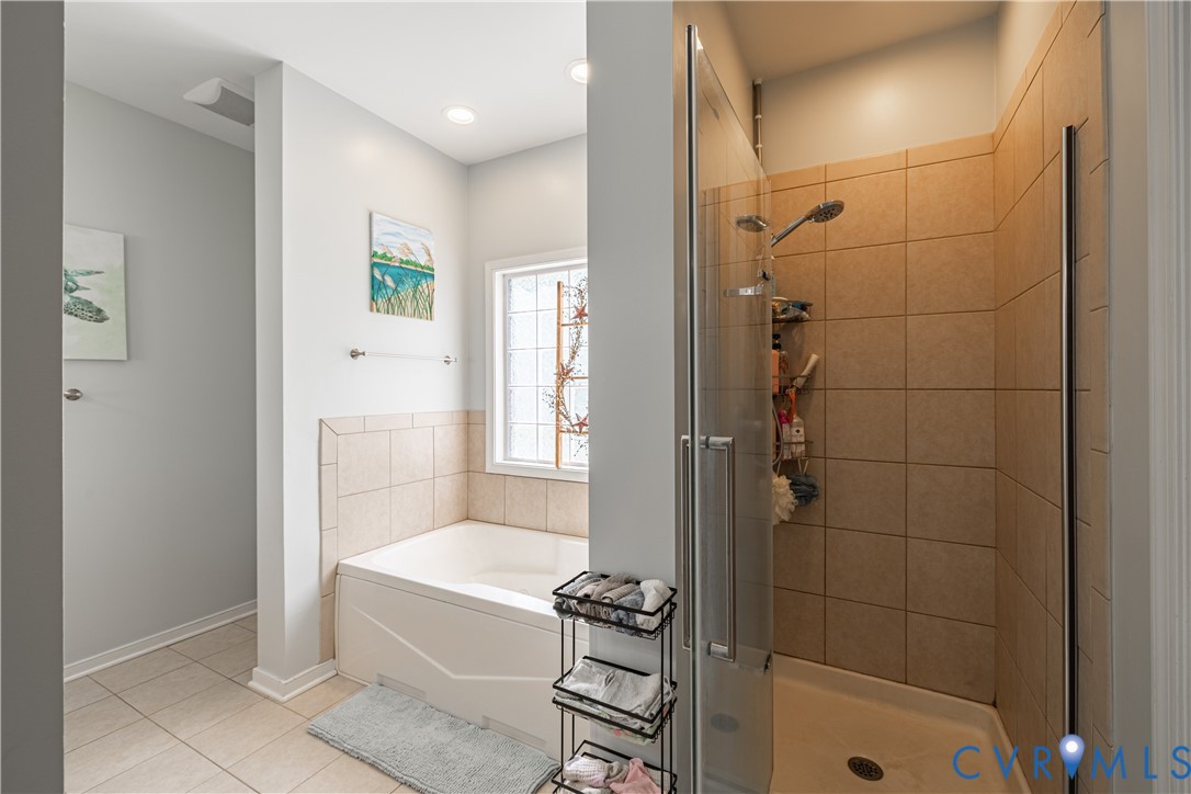 4789 Tatum Road Disputanta, VA 23842 - Photo 27 of 46 a bathroom with a tub shower and a sink