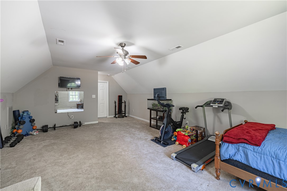 4789 Tatum Road Disputanta, VA 23842 - Photo 29 of 46 a view of a room with gym equipment