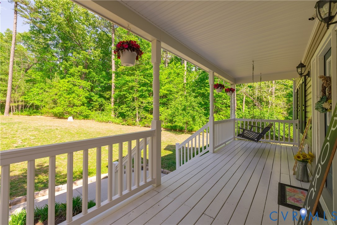 4789 Tatum Road Disputanta, VA 23842 - Photo 3 of 46 a view of balcony with wooden floor