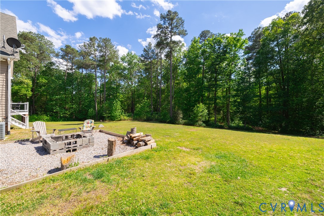 4789 Tatum Road Disputanta, VA 23842 - Photo 38 of 46 a view of pool and chair in the patio