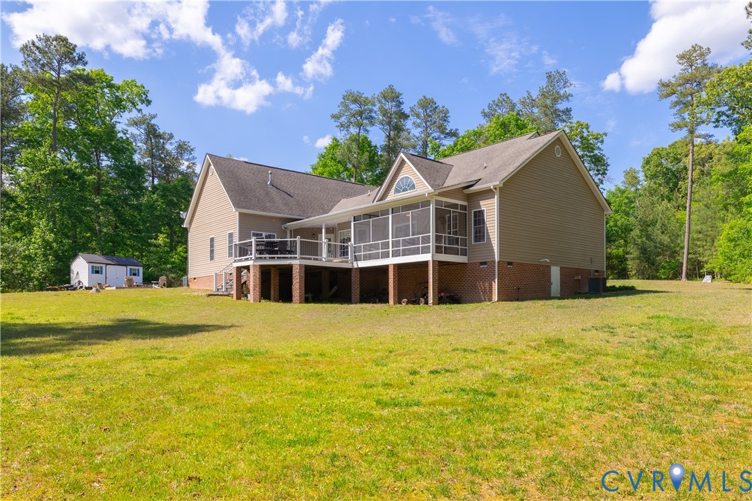 4789 Tatum Road Disputanta, VA 23842 - Photo 41 of 46 a front view of house with an outdoor space and swimming pool