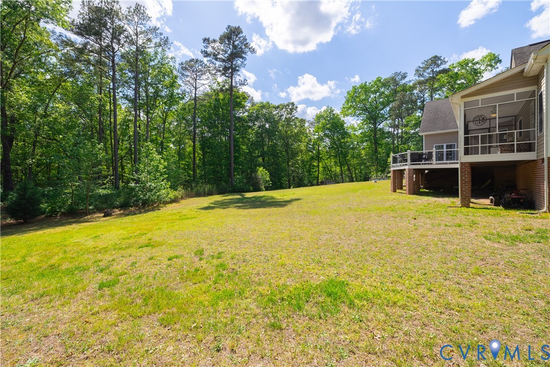 4789 Tatum Road Disputanta, VA 23842 - Photo 42 of 46 a swimming pool with trees in the background
