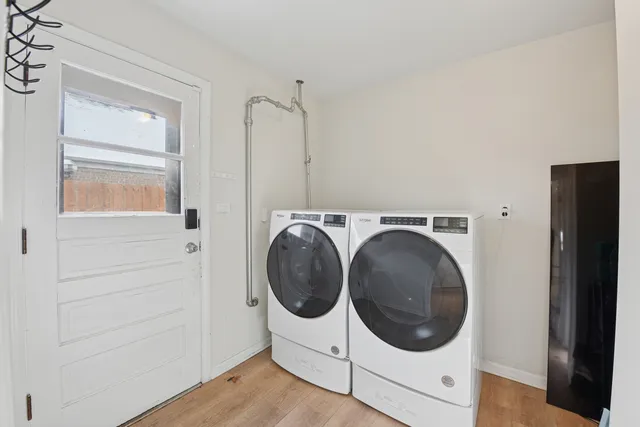 a utility room with dryer and washer