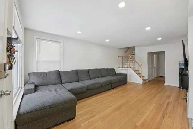 a living room with furniture and a couch
