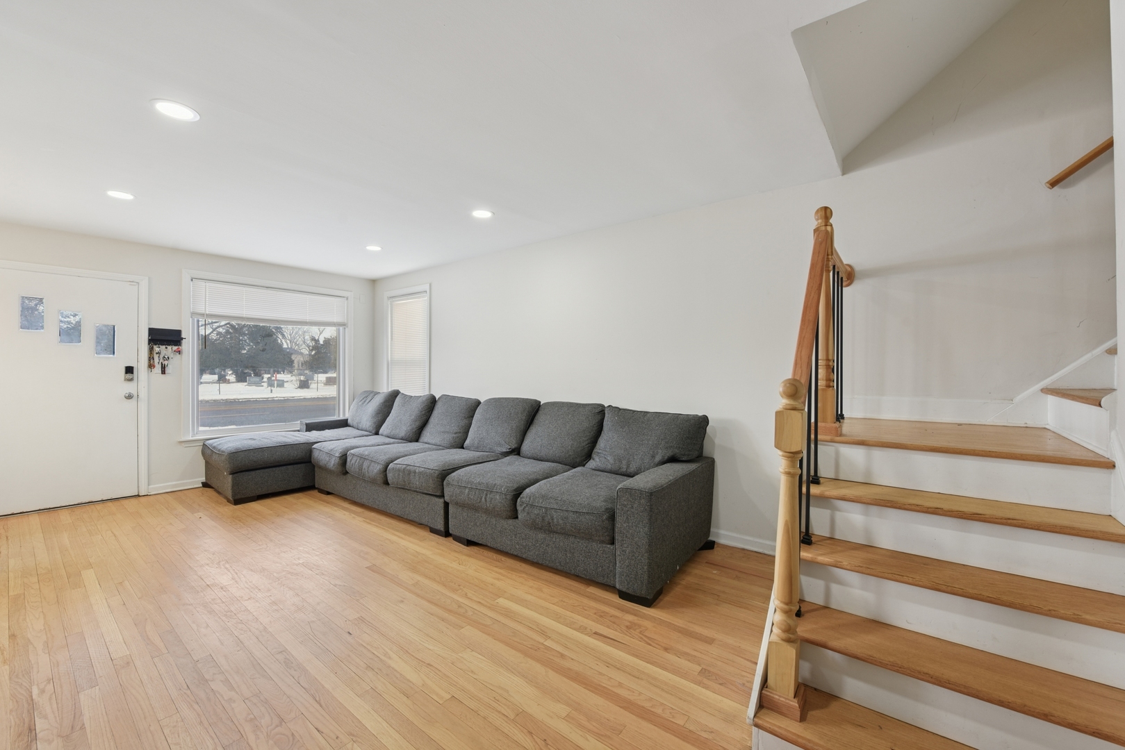 4137 Ruby Street Schiller Park, IL 60176 - Photo 5 of 24 a living room with furniture and a painting