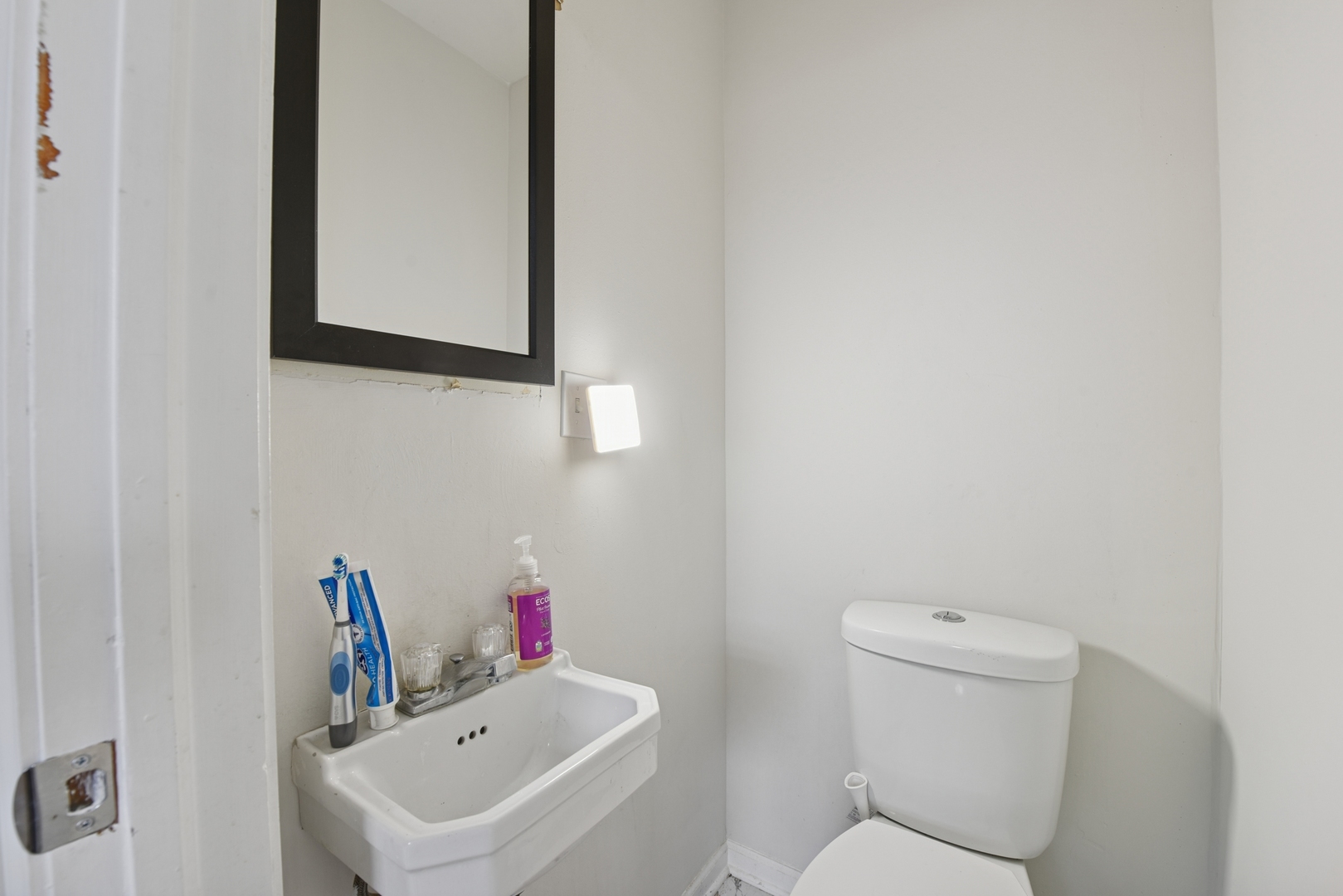 4137 Ruby Street Schiller Park, IL 60176 - Photo 9 of 24 a bathroom with a sink mirror and toilet