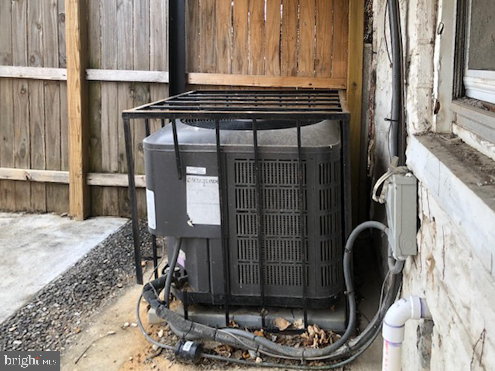 1673 Darley Avenue Baltimore, MD 21213 - Photo 16 of 17 a front view of a house with wooden floor