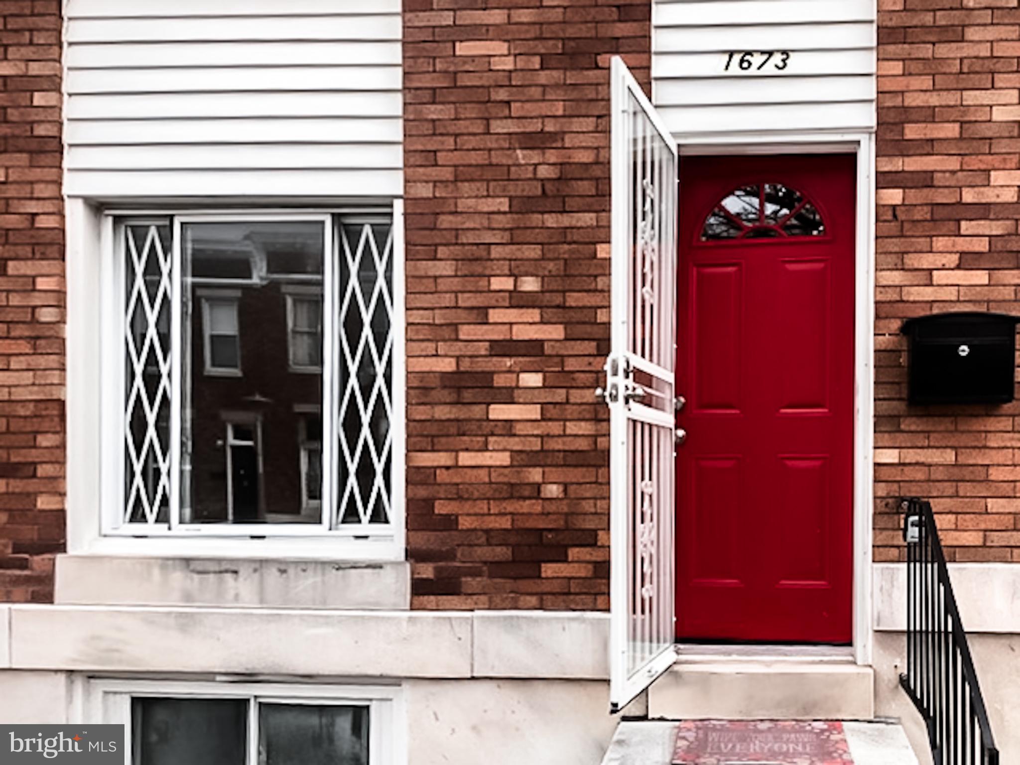 1673 Darley Avenue Baltimore, MD 21213 - Photo 3 of 17 a view of a door of the house