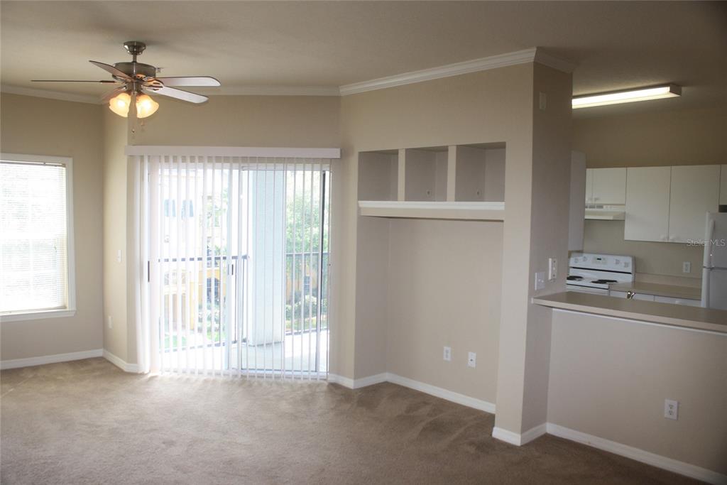 3621 Conroy Road, Unit 739 Orlando, FL 32839 - Photo 8 of 20 a view of an empty room with a window