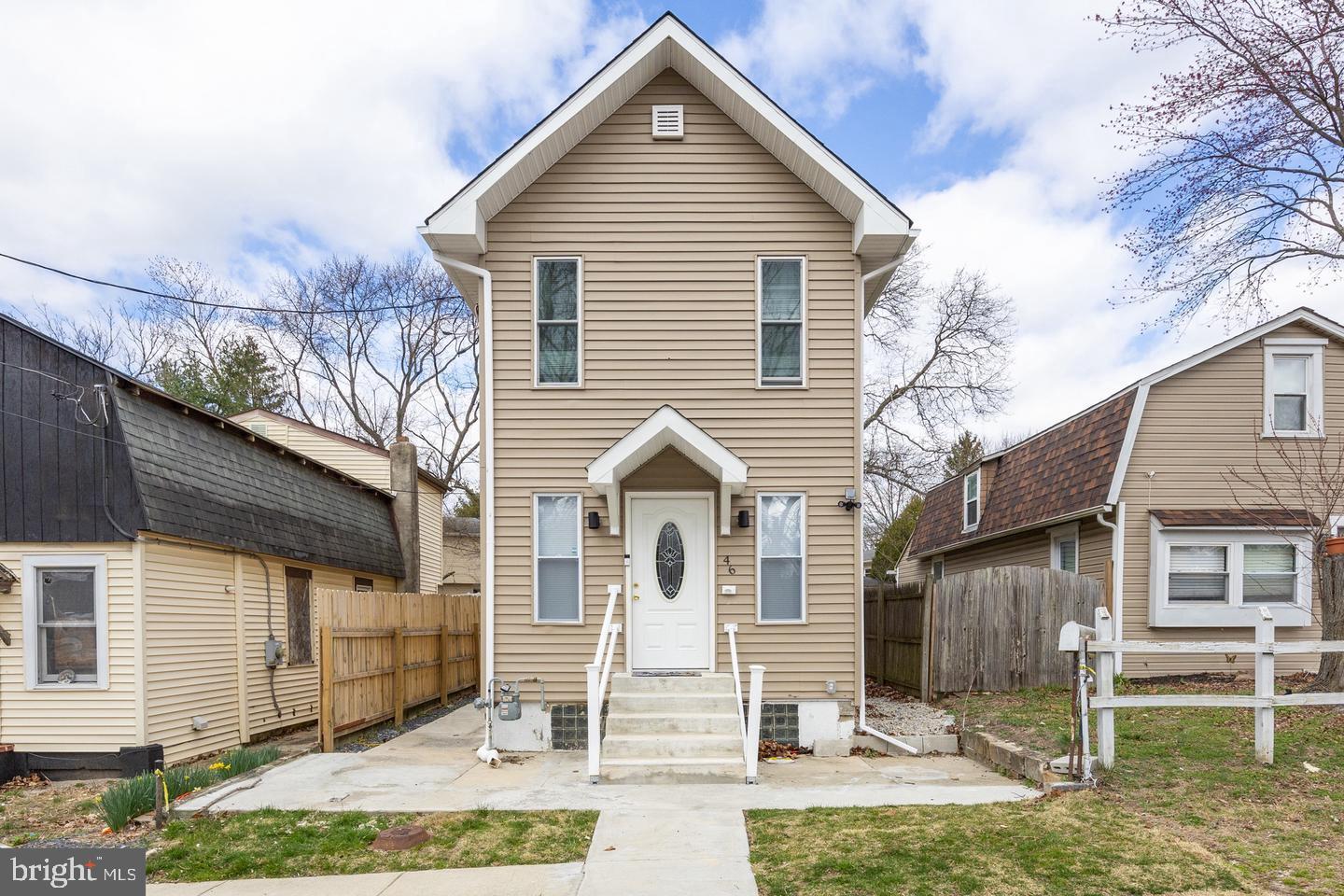 Charming two-story home with inviting facade.