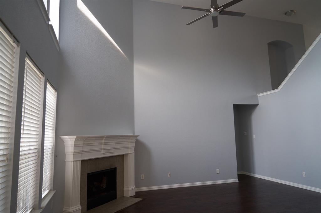 4469 Big Sky Drive Plano, TX 75024 - Photo 11 of 39 a view of a livingroom with a fireplace