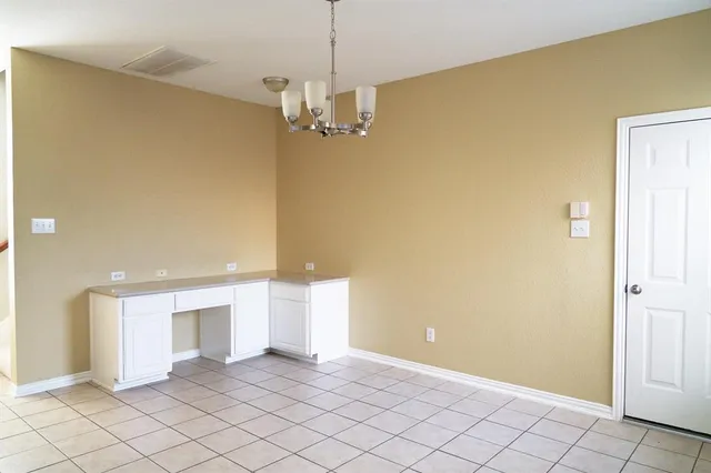 a view of a livingroom with furniture