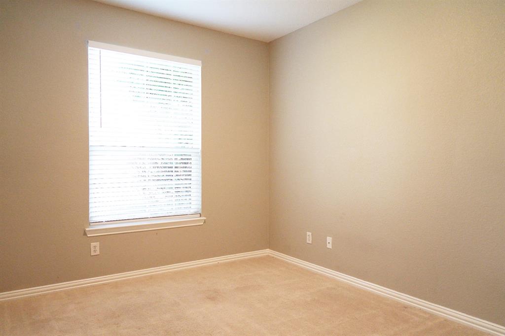4469 Big Sky Drive Plano, TX 75024 - Photo 23 of 39 an empty room with a window
