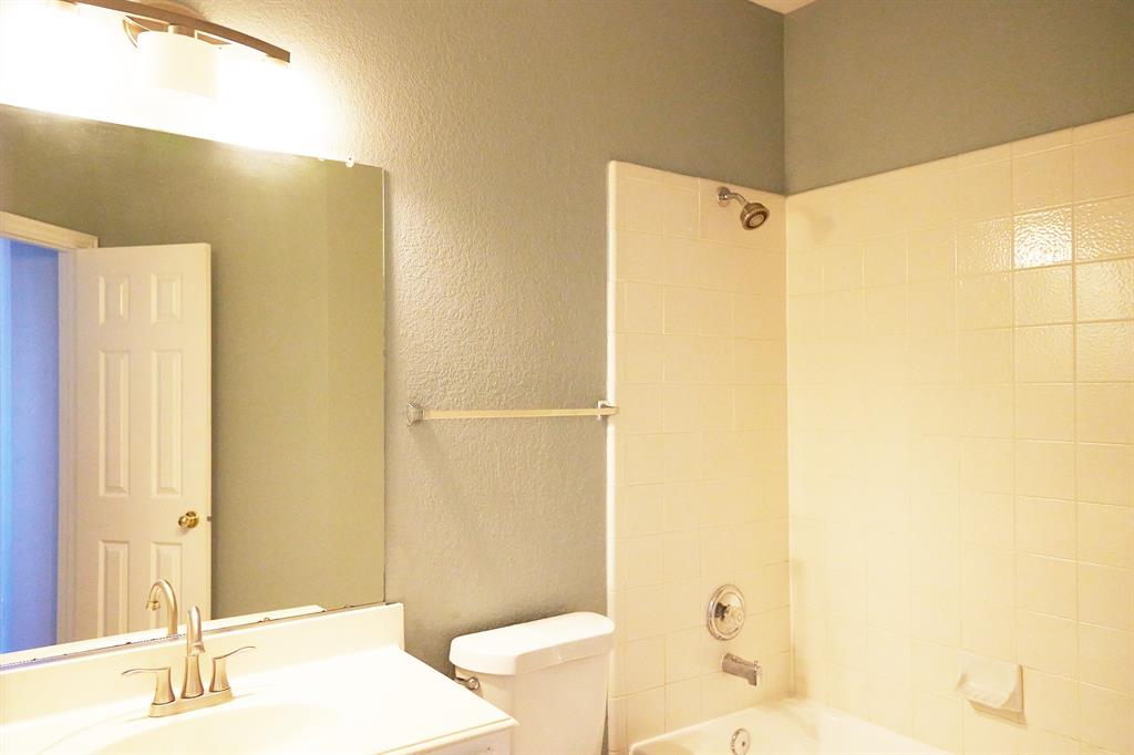 4469 Big Sky Drive Plano, TX 75024 - Photo 24 of 39 a bathroom with a sink and toilet