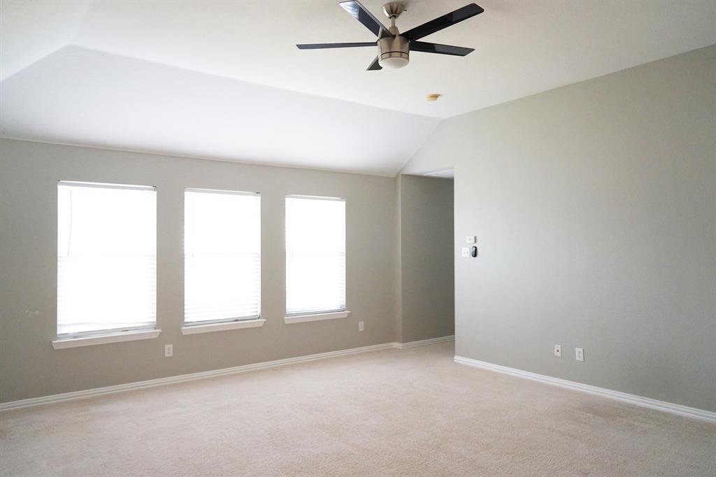 4469 Big Sky Drive Plano, TX 75024 - Photo 27 of 39 a view of a livingroom with a ceiling fan and window